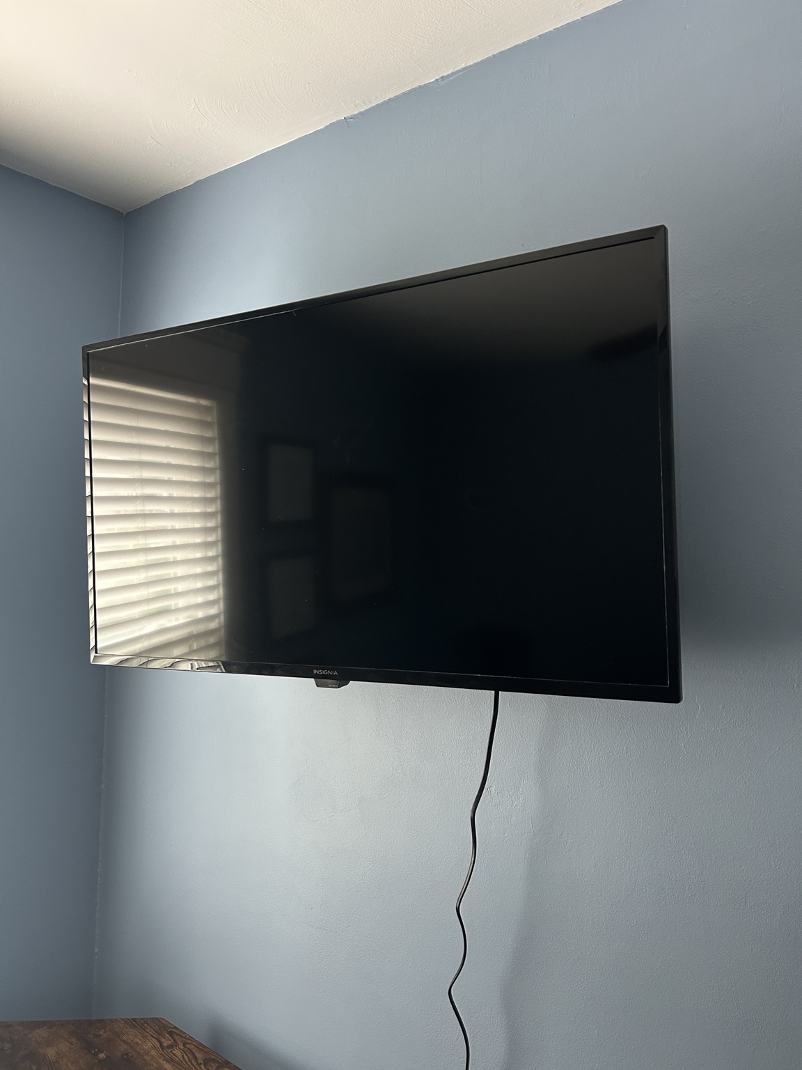 Wall-mounted TV installation